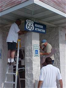 Putting Up the Sign